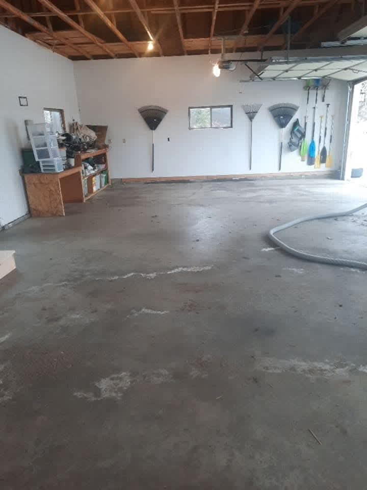 Stained concrete floor before resurfacing