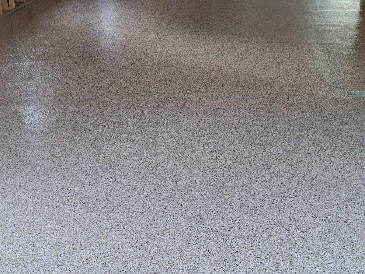 Gray shop-floor polyurea coating, residential workshop